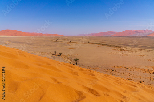 Aerial view of high red dunes in the Namib Naukluft National Park of Namibia