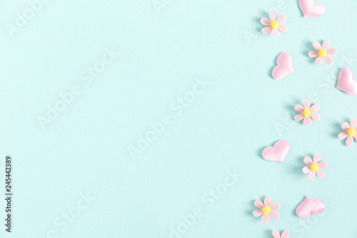 Valentine s Day background. Floral decor and pink hearts on pastel blue background. Valentines day concept  design. Flat lay  top view  copy space - Image