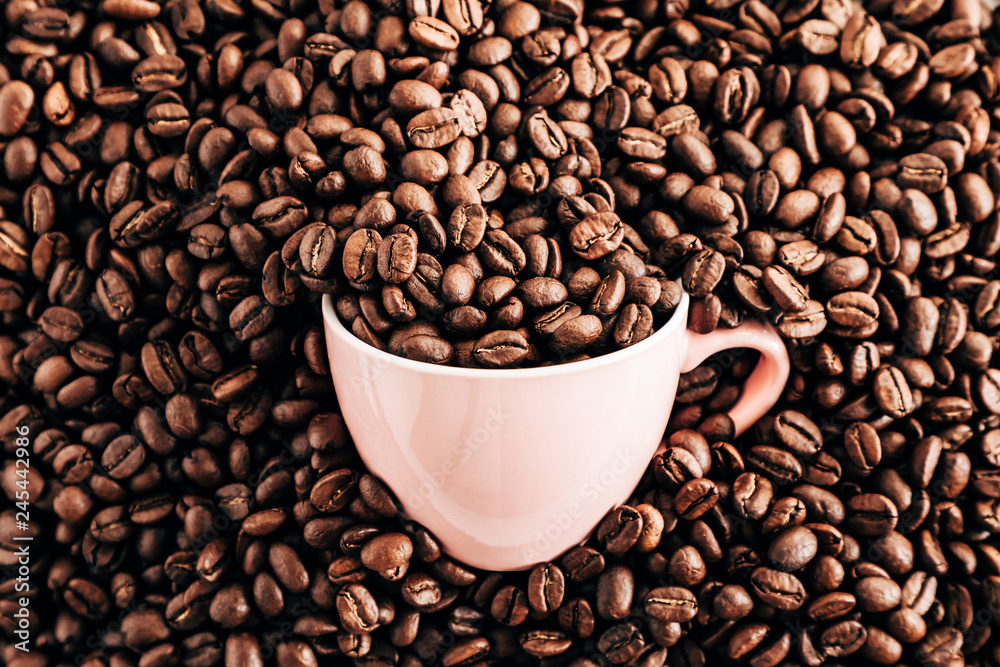 Roasted coffee beans background. Flat lay, top view Roasted coffee beans background. Flat lay, top view