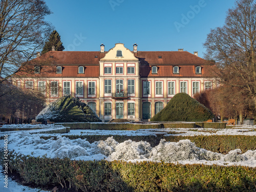 Abbots Palace built in the rococo style and located in Oliwa park. Winter scenery. Gdansk, Poland