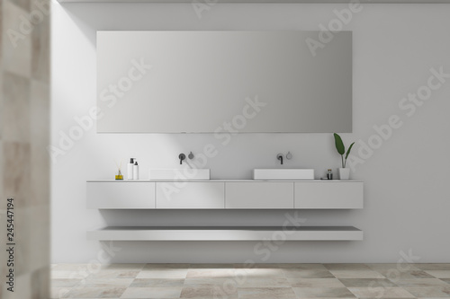 Tiled white double bathroom sink with mirror