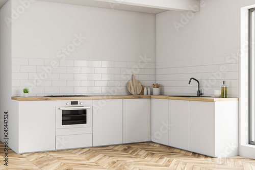 White kitchen corner with countertops
