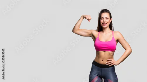 Obraz Piękny sprawności fizycznej dziewczyny pozować