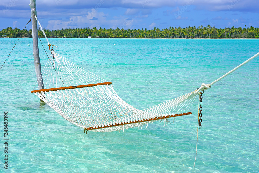 Φωτογραφία Hammock with a view, planted in the azure waters of the Bora Bora lagoon, French