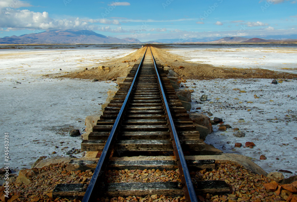 Train tracks in the Salt Flats of Uyuni Train tracks in the Salt Flats of Uyuni
