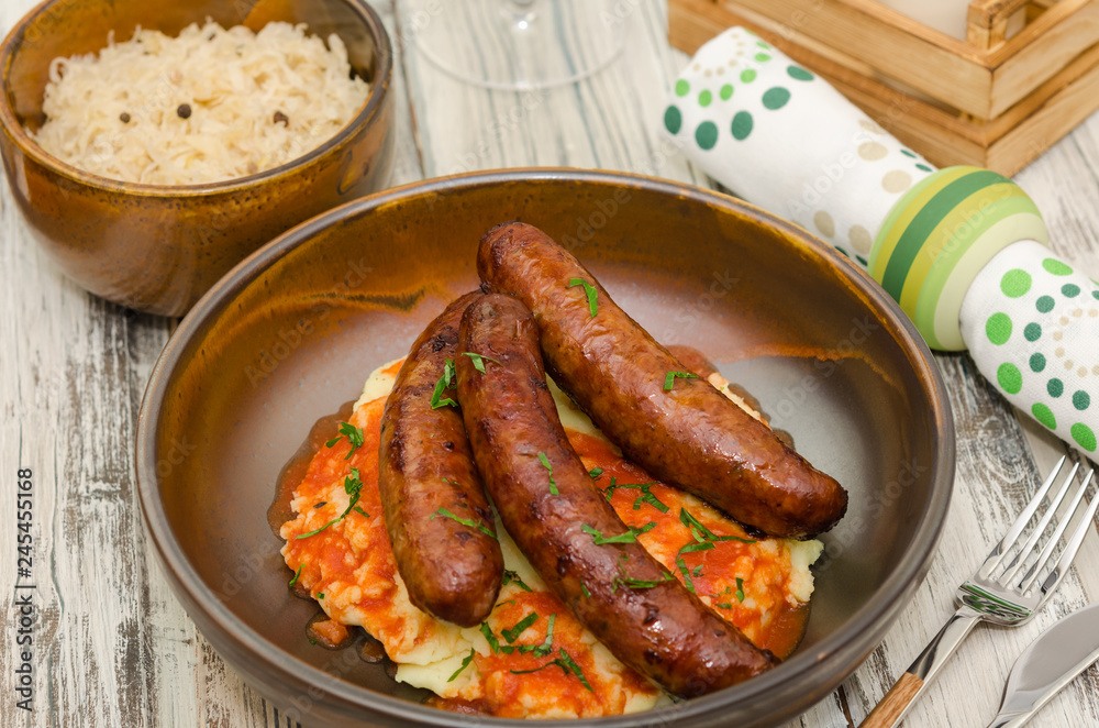 Sausages and mashed potatoes. Homemade bangers and mash Sausages and mashed potatoes. Homemade bangers and mash
