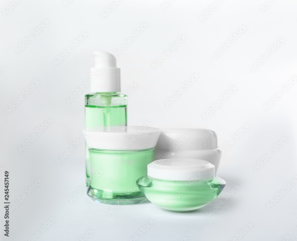 Different body care products on white background Different body care products on white background