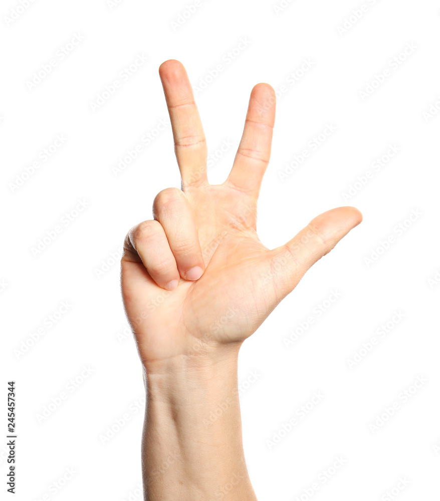 Man showing number three on white background, closeup. Sign language Man showing number three on white background, closeup. Sign language