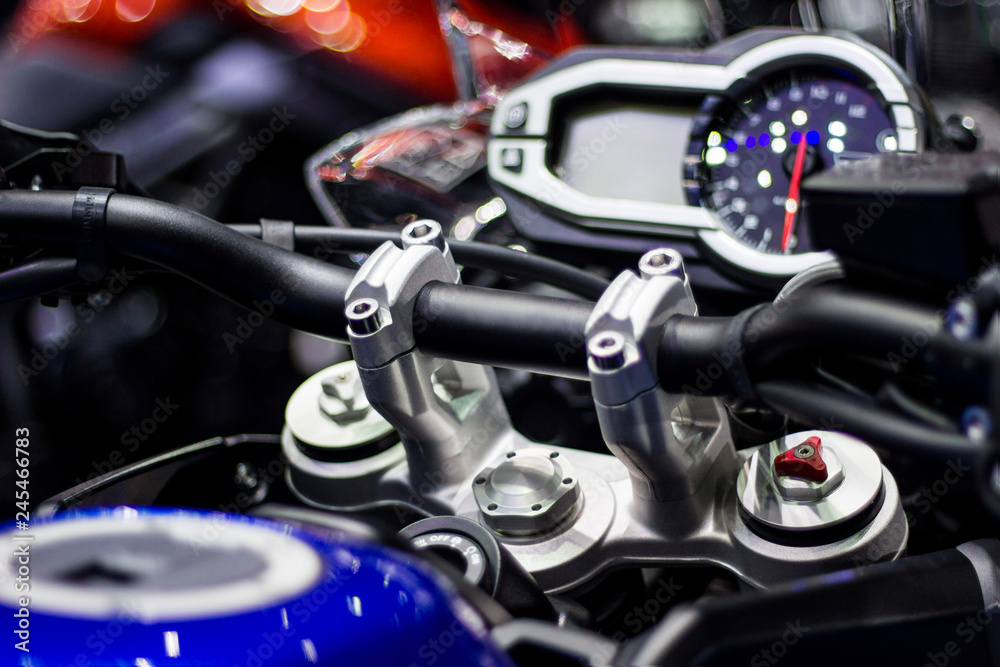 Speedometer and chrome parts on motorcycle handlebar