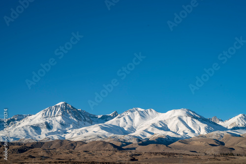 snowy mountains in the Eastern Sierra Nevadas, California, USA © mariekazalia