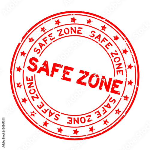 Grunge red safe zone word round rubber seal stamp on white background