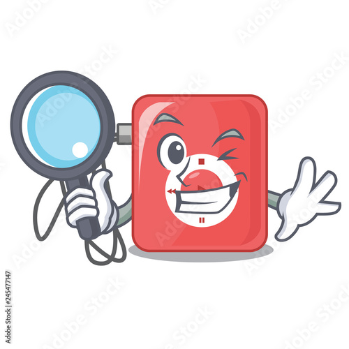 Detective charcter mp3 player above wooden table
