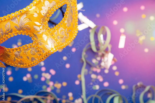 Brazilian Carnival concept. Carnival mask in illustrative background.