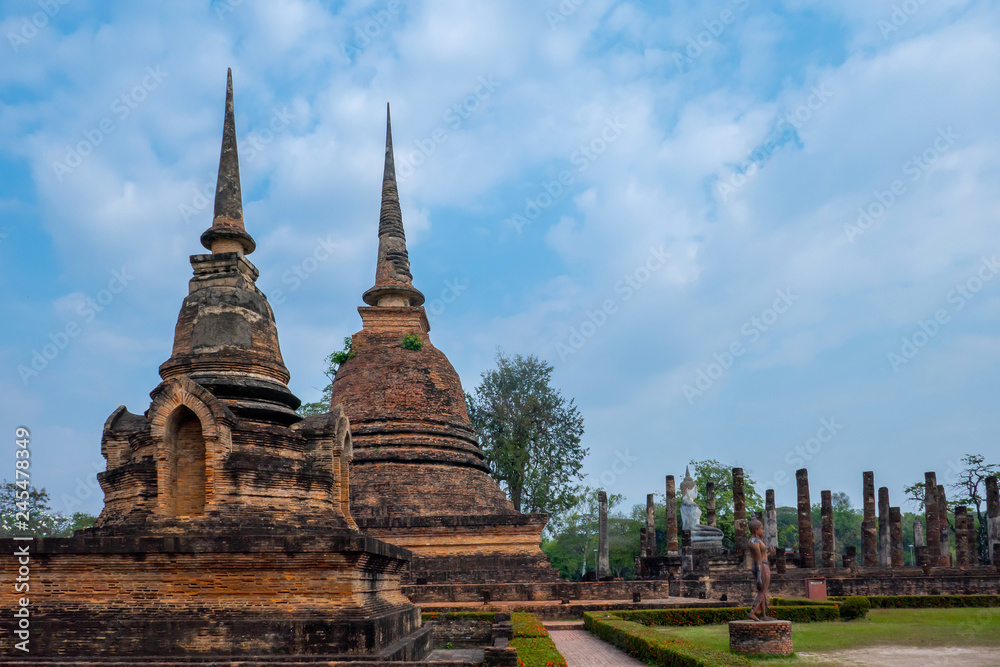 The art such as temple building and sculpture about Buddhism religion in the old city where called Sukhothai in the sunny day. 