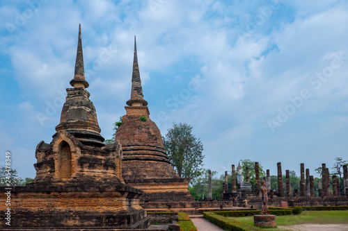 The art such as temple building and sculpture about Buddhism religion in the old city where called Sukhothai in the sunny day. 