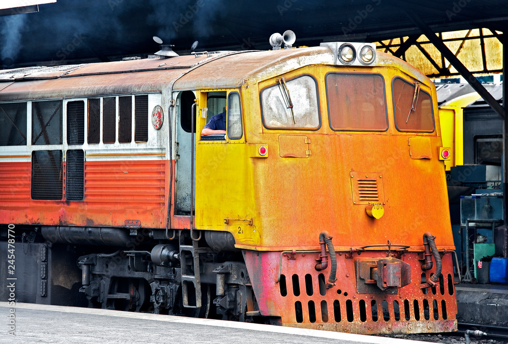 Bright colored train at Hualamphong Train Station in Bangkok Bright colored train at Hualamphong Train Station in Bangkok