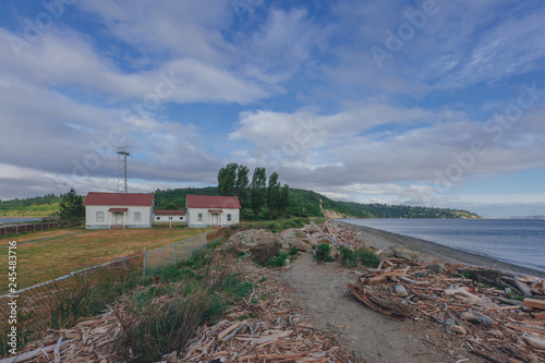 Houses by beach and water in Discovery Park of Seattle, USA