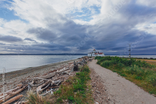 Path leading to the Victorian-era lighthouse in Discovery Park  Seattle  USA