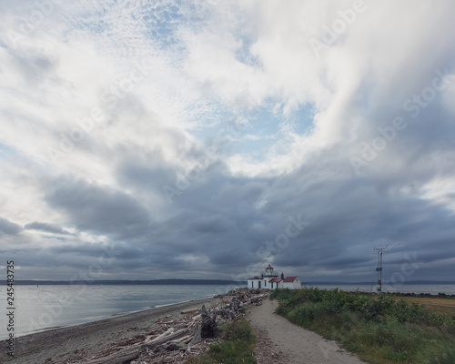 Path leading to the Victorian-era lighthouse in Discovery Park  Seattle  USA