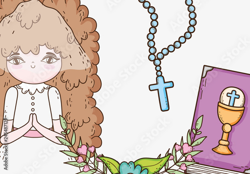 girl first communion with rosary and bible