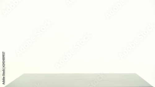 Wallpaper Mural Male hand picks up a glass of beer from the table. White background Torontodigital.ca