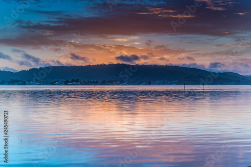 Early Morning Clouds and Reflections on the Bay