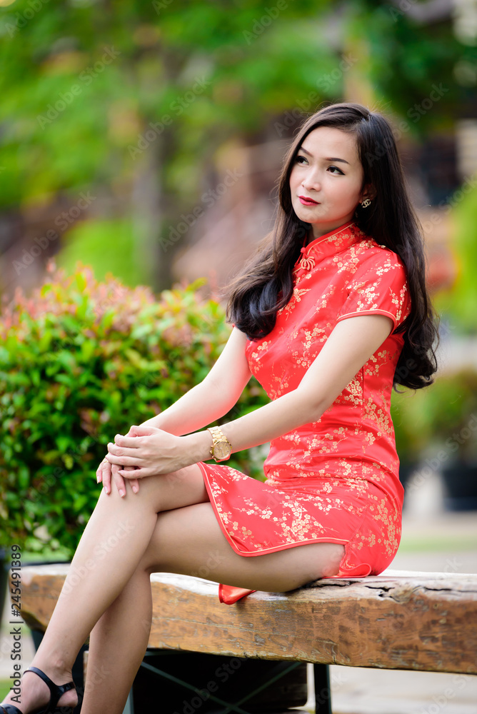 Naklejka premium Portrait of Asian Chinese and Thai girl with Happy Chinese New Year concept.