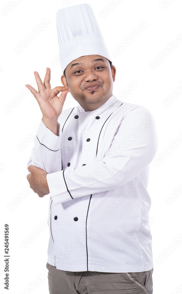 portrait of asian young chef with delicious gesture