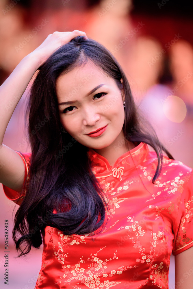 Portrait of Asian Chinese and Thai girl with Happy Chinese New Year concept.