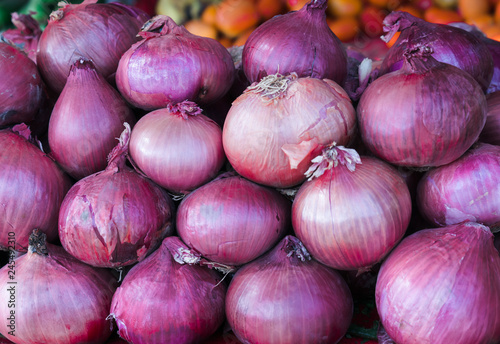 Organic onions in farmers market closeup