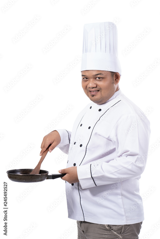 images of chef cooking with holding pan and spatula look at the camera images of chef cooking with holding pan and spatula look at the camera