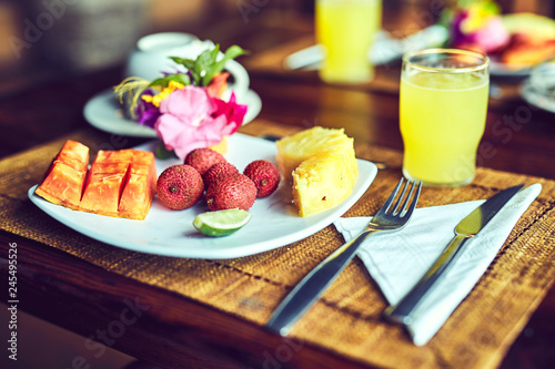 breakfast with exotic fruits and fresh orange juice