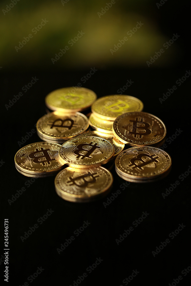 gold coin, silver coin, on a green, blue, black background. cryptocurrency.