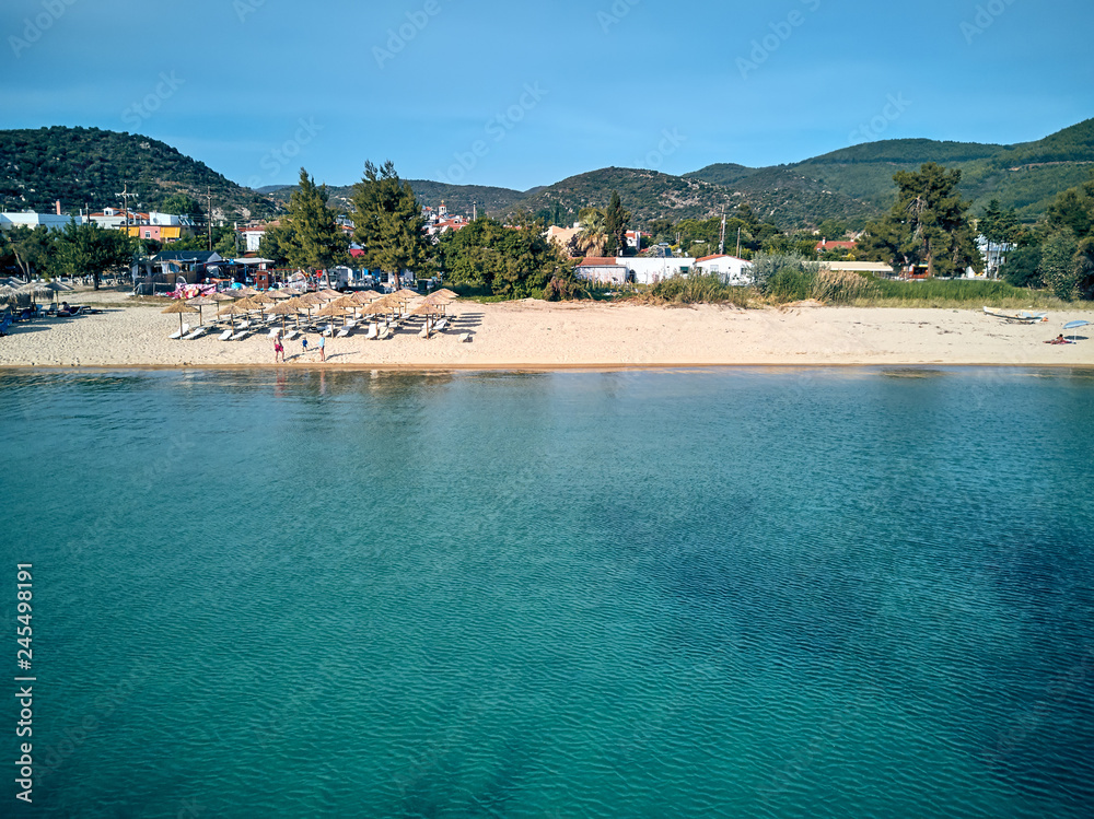 Beautiful beach with family drone shot Beautiful beach with family drone shot