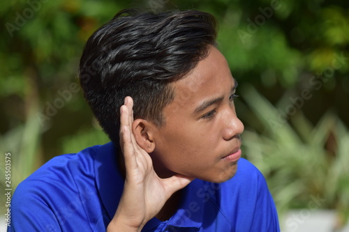 A Teenage Male Listening