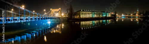 Night panoramic view of the Odra River in a beautiful city of Wroclaw located in the southwestern part of Poland