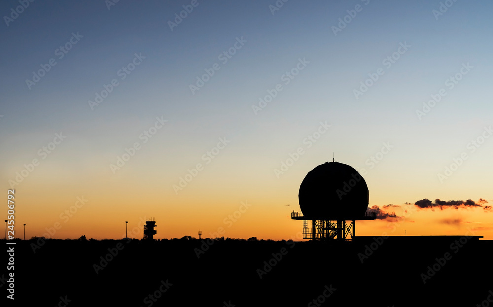 Obraz premium Airport radar tower low light silhouette