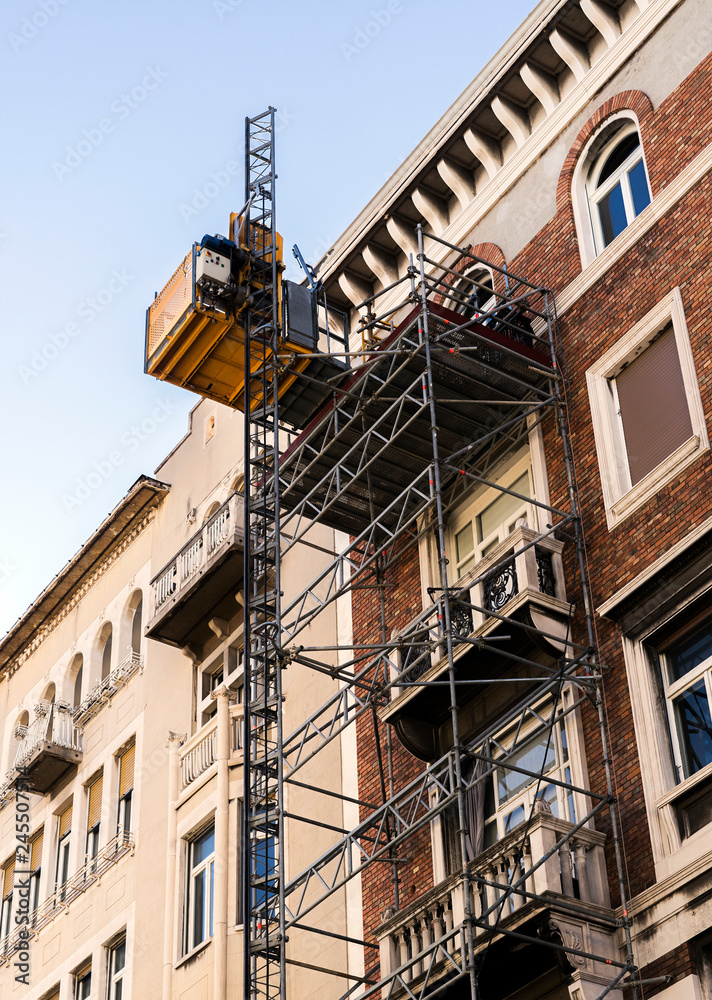 Construction site with small elevator