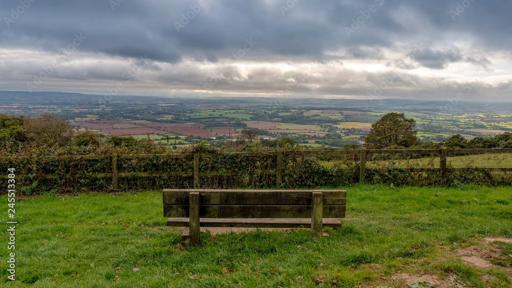 A bench with view over the Quantock Hills landscape near West Bagborough, Somerset, England, UK