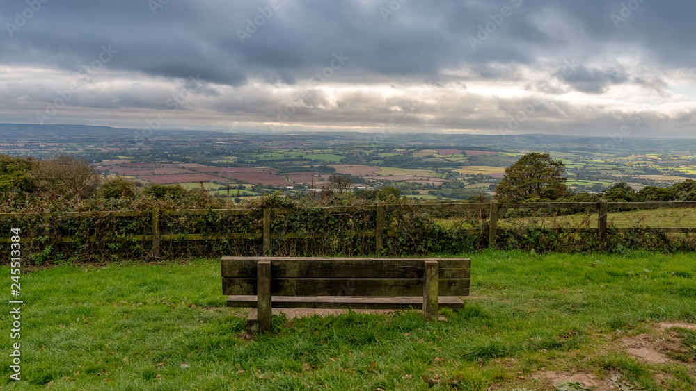 A bench with view over the Quantock Hills landscape near West Bagborough, Somerset, England, UK A bench with view over the Quantock Hills landscape near West Bagborough, Somerset, England, UK