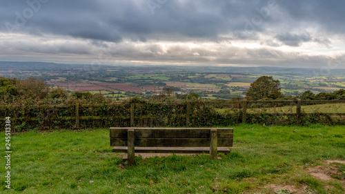 A bench with view over the Quantock Hills landscape near West Bagborough, Somerset, England, UK