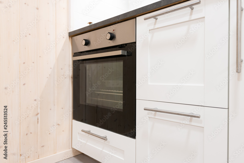 Fototapeta premium Built in modern oven in kitchen