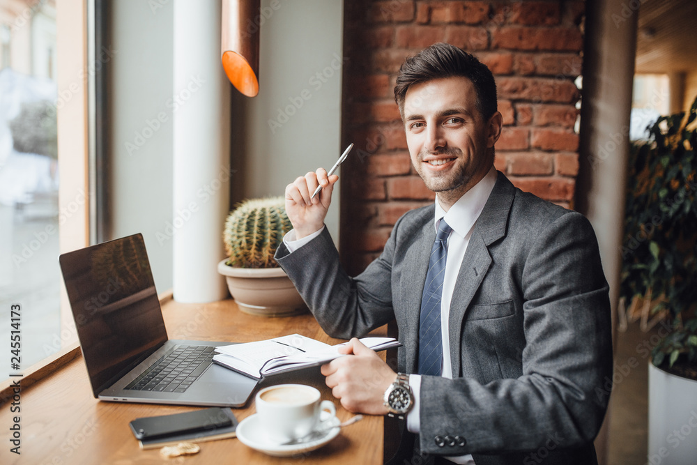 Fototapeta premium Businessman in caffe