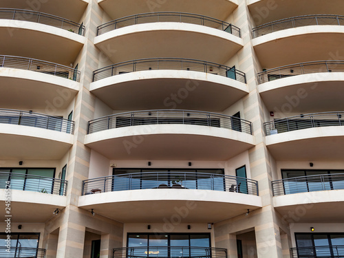 Sliema, Malta, on January 5, 2019. Modern city architecture. Fragment of a facade of the multystoried building photo