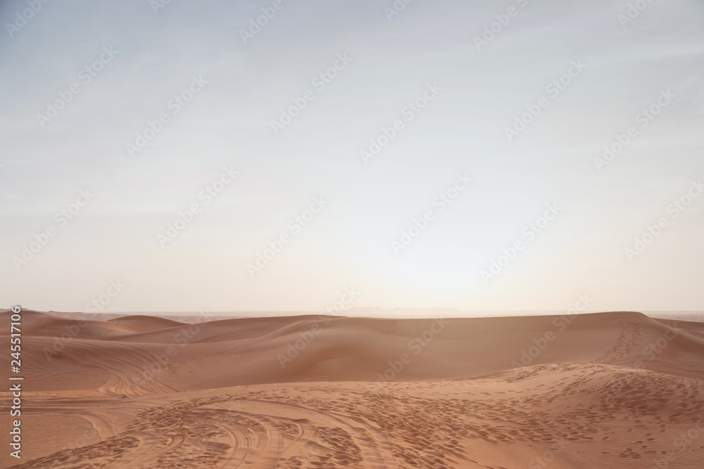 Colorful red sunset over desert