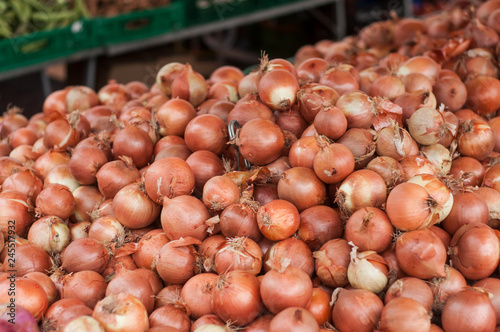 closeup of onions stack at the market