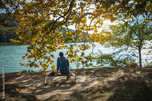 Quadro em tela Handsome Man Sit by Lake