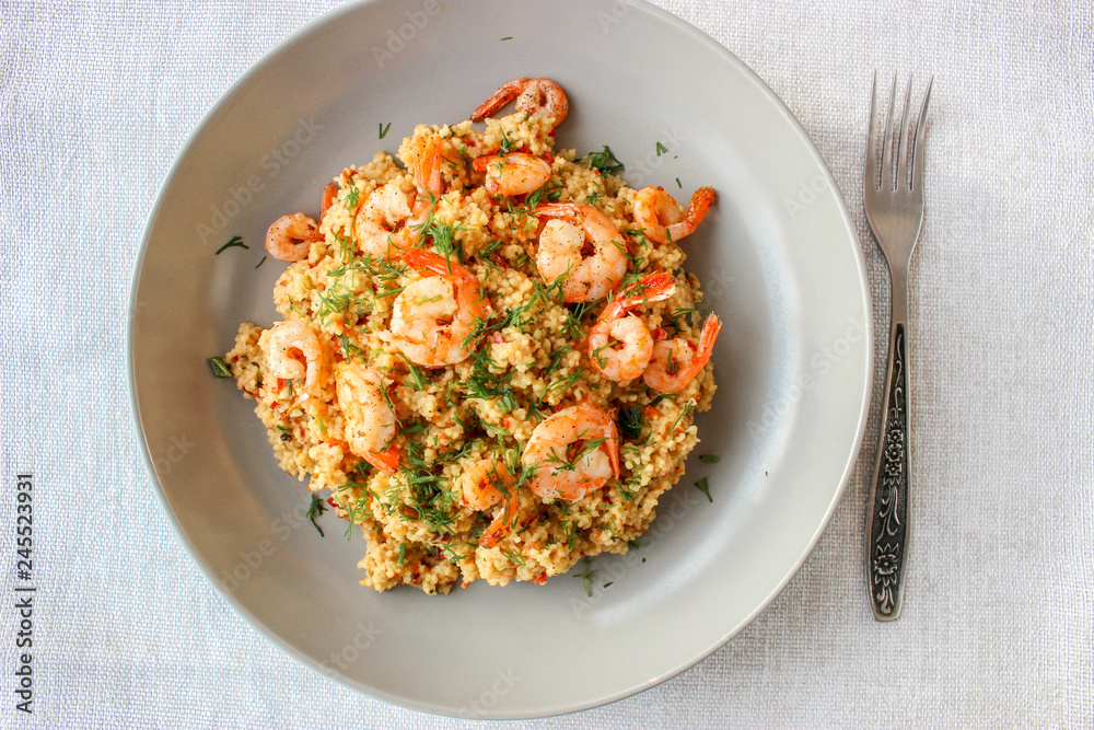 Grits cous cous with vegetables and grilled shrimp Grits cous cous with vegetables and grilled shrimp