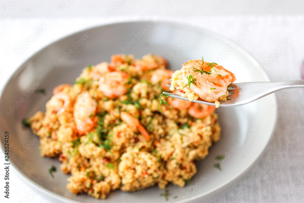 Grits cous cous with vegetables and grilled shrimp Grits cous cous with vegetables and grilled shrimp