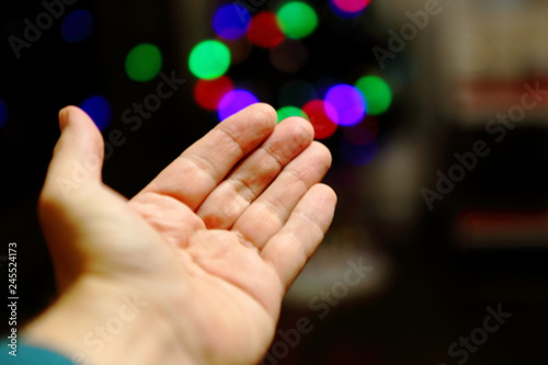 hands on black background